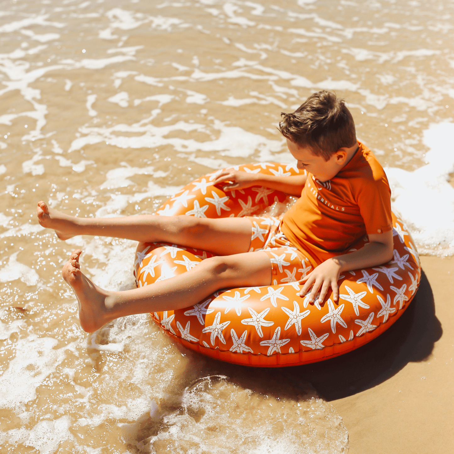 Schwimmring Orange mit Seesternmuster