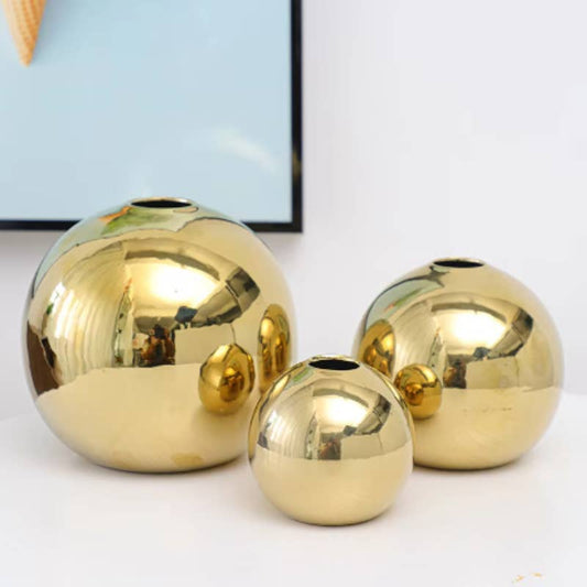 Runde goldene Vasen – stilvolle Deko-Akzente für jede Jahreszeit